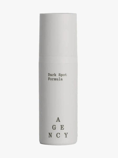 Agency by Curology Dark Spot Formula gray bottle on light gray background